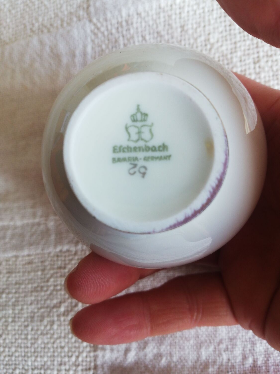 Very small round vase in off-white color with gold edging ESCHENBACH