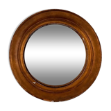 Witch's mirror with wood frame and curved ice