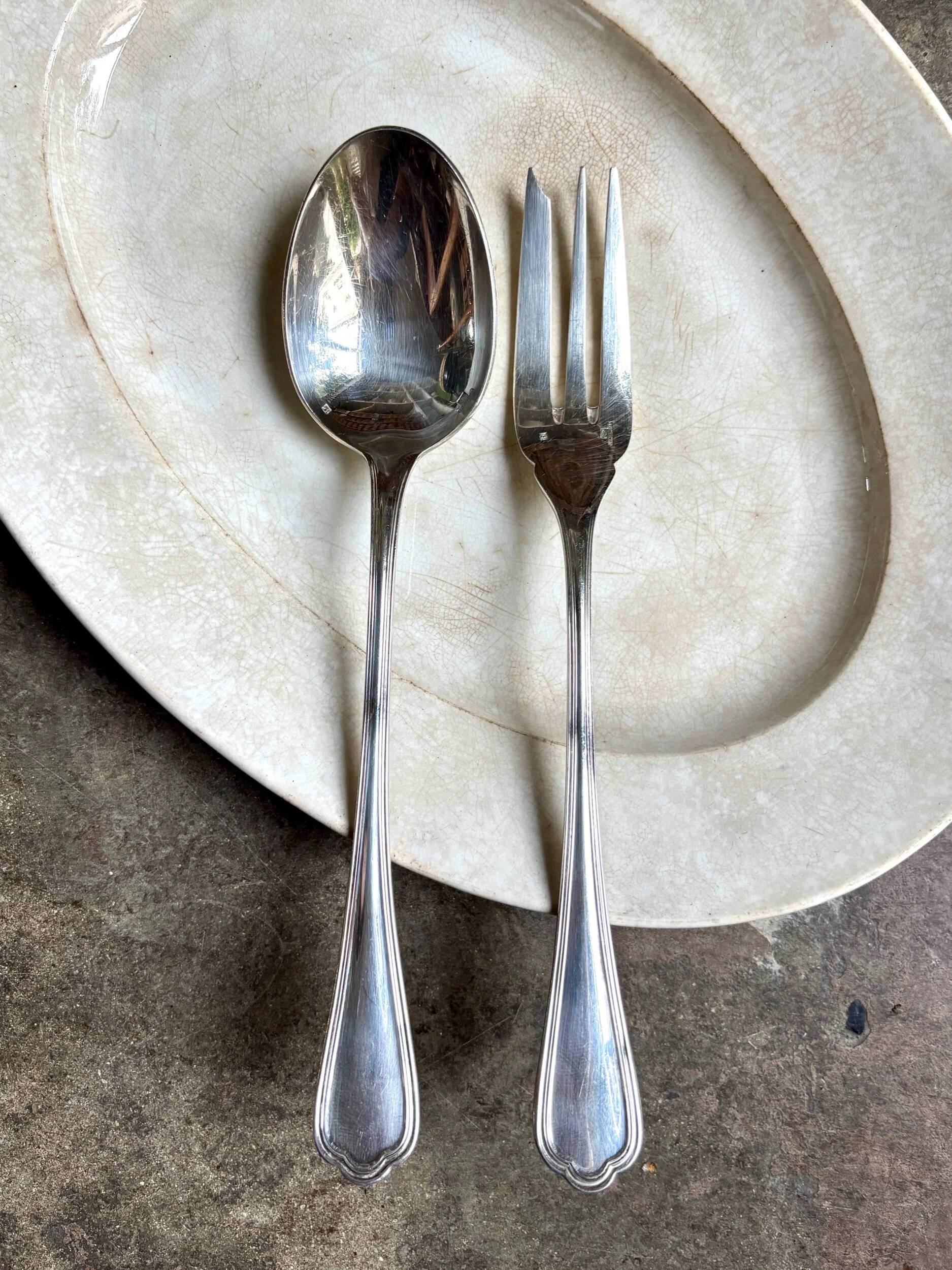 2 Christofle silver-plated serving cutlery, "Spatours" pattern.