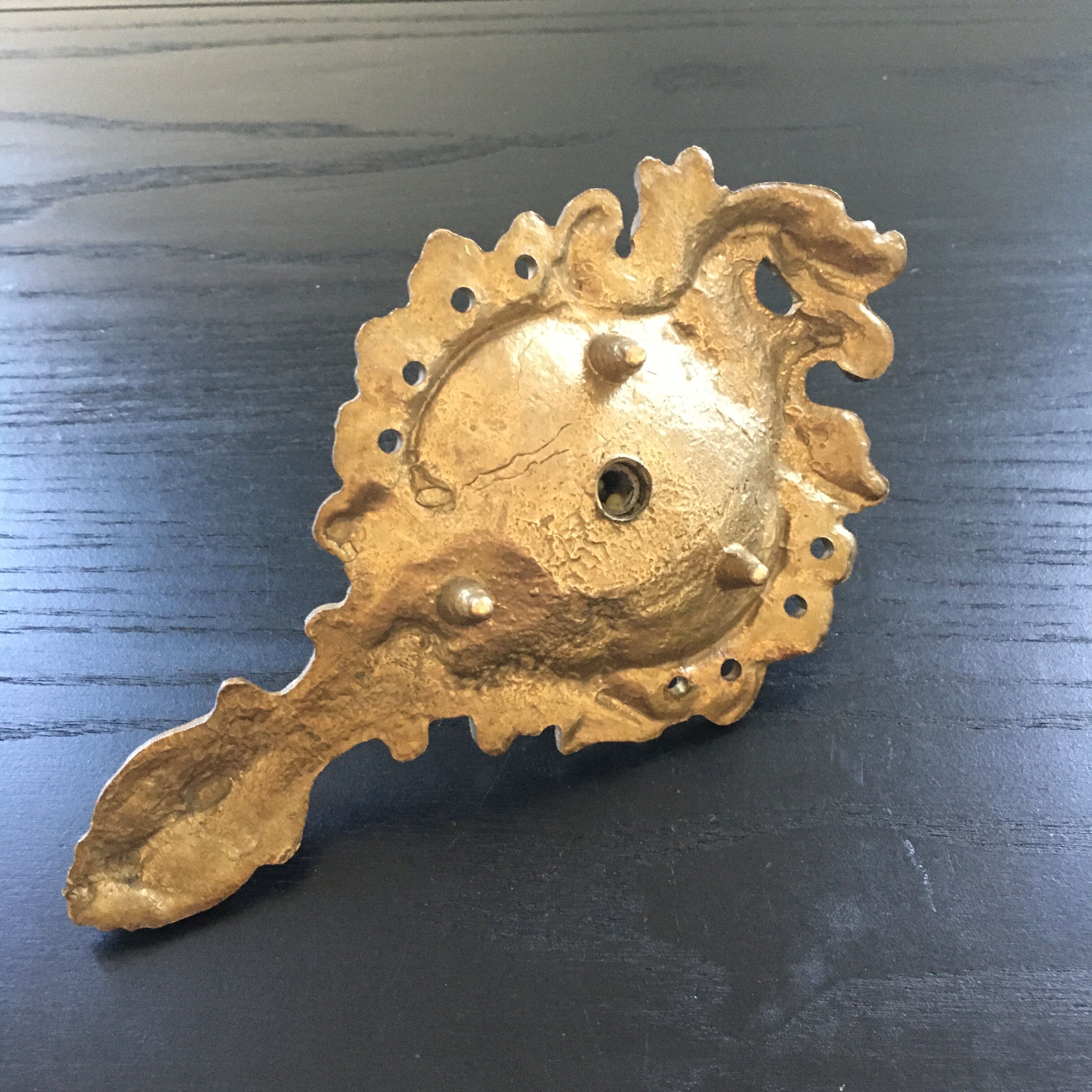 Gilded bronze rock holder