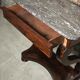 Console era restoration in mahogany veneer with St. Anne marble top.