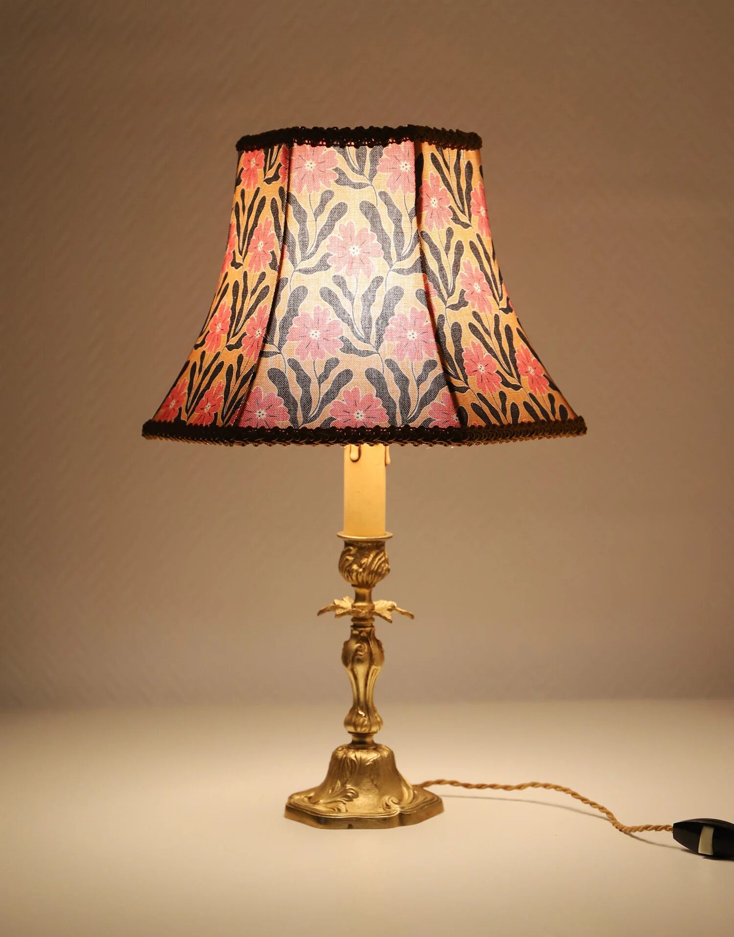 Recycled vintage lamp — antique bronze candlestick base and graphic flowers