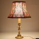 Recycled vintage lamp — antique bronze candlestick base and graphic flowers