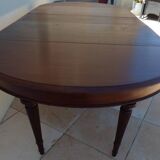 Extendable mahogany table with 6 tapered and fluted legs, Louis XVI style