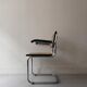 Cesca armchair with metal and wood armrest by Marcel Breuer