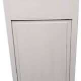 Wooden bedside drawer and a door