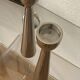 Pair of polished aluminium candlesticks