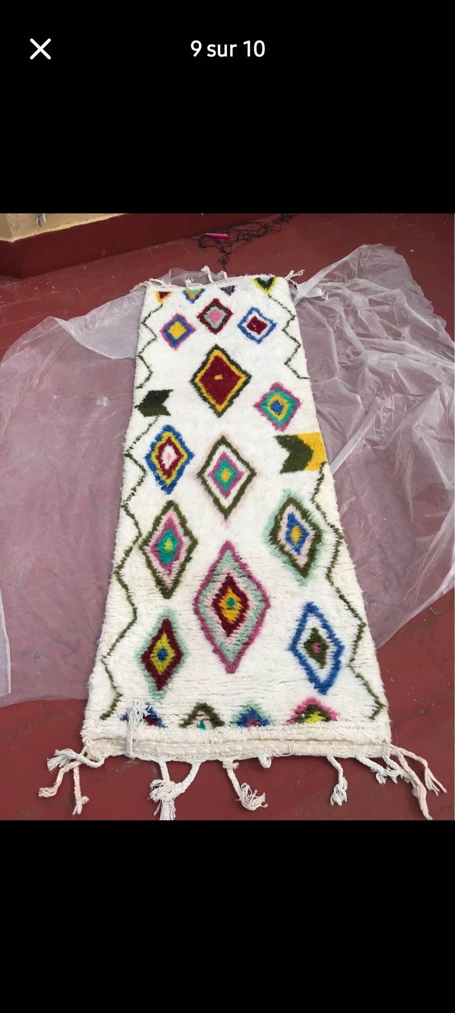 Colourful Moroccan rug made of natural wool. Woven by artisans.
