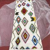 Colourful Moroccan rug made of natural wool. Woven by artisans.