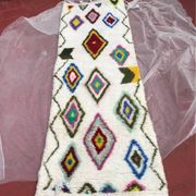 Colourful Moroccan rug made of natural wool. Woven by artisans.