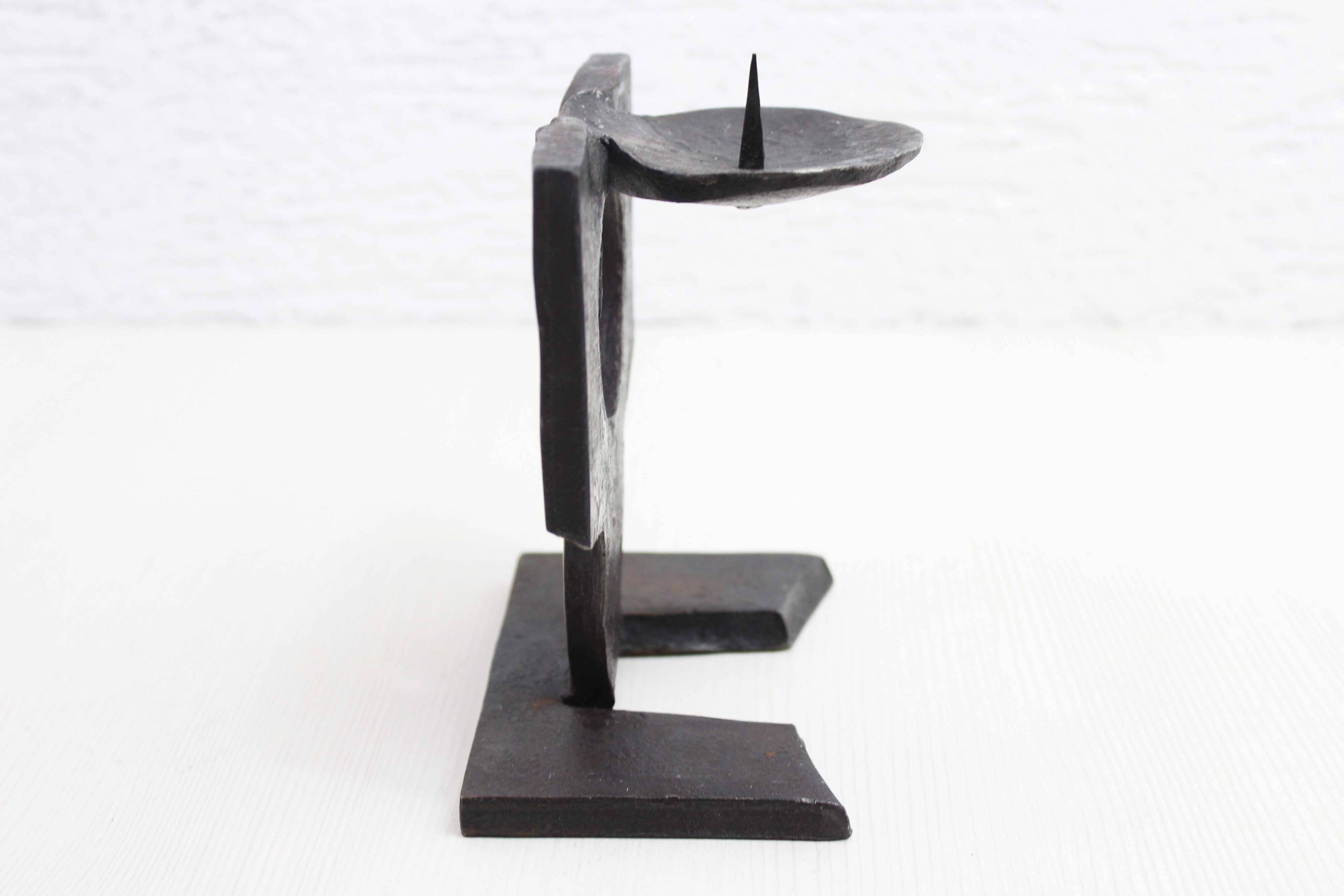 Brutalist cast iron candlestick