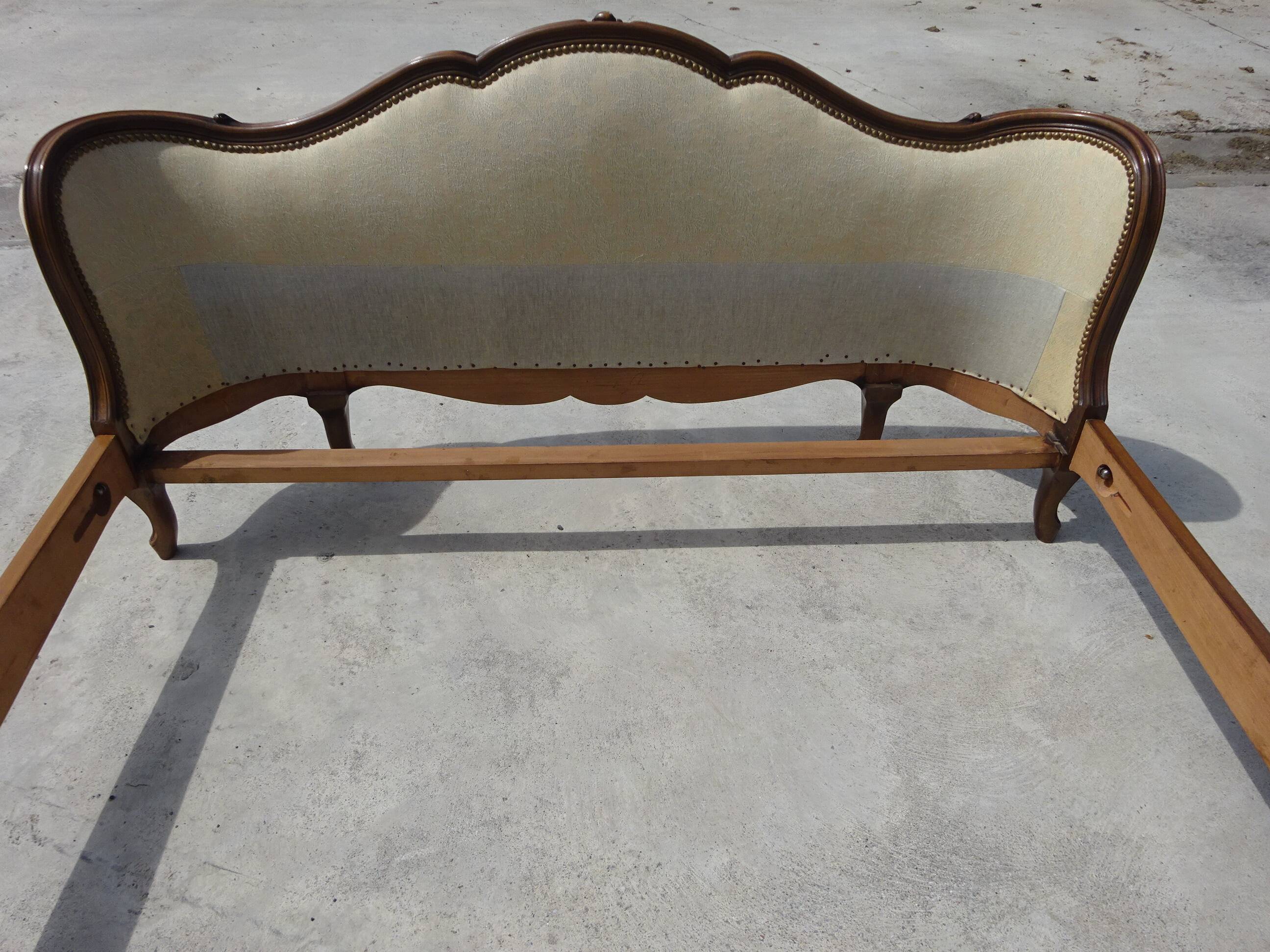 Solid wood bed frame with Jacquard fabric.