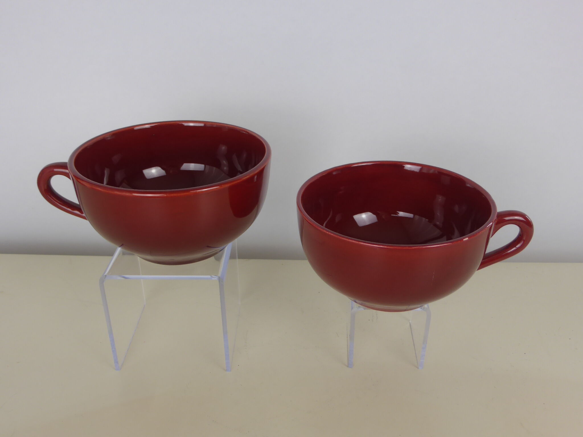 2 Old bowls with ox blood colored handle in St Clément earthenware