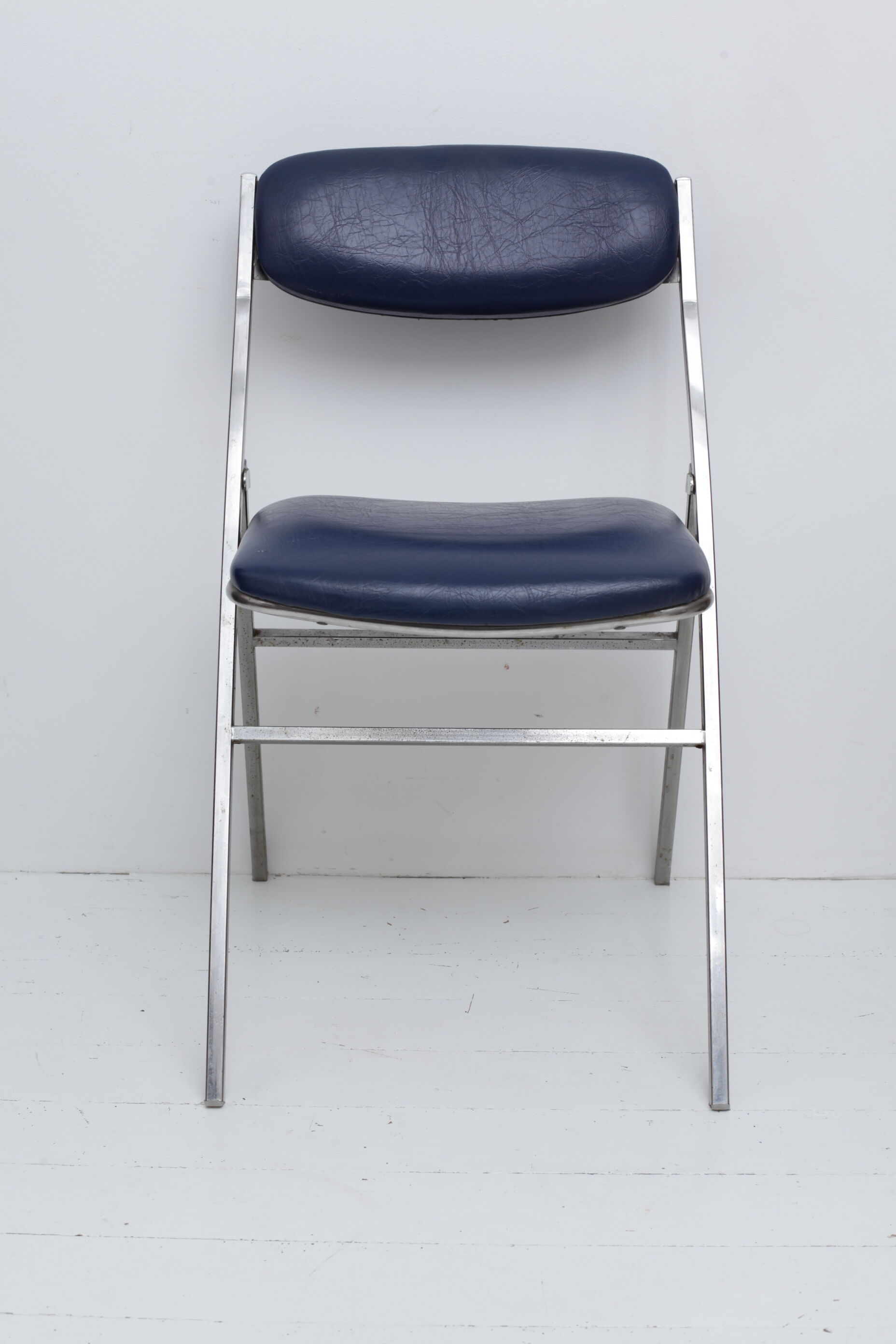 Folding blue skaï chair - chrome legs