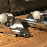 Pair space Age chrome metal wall appliques