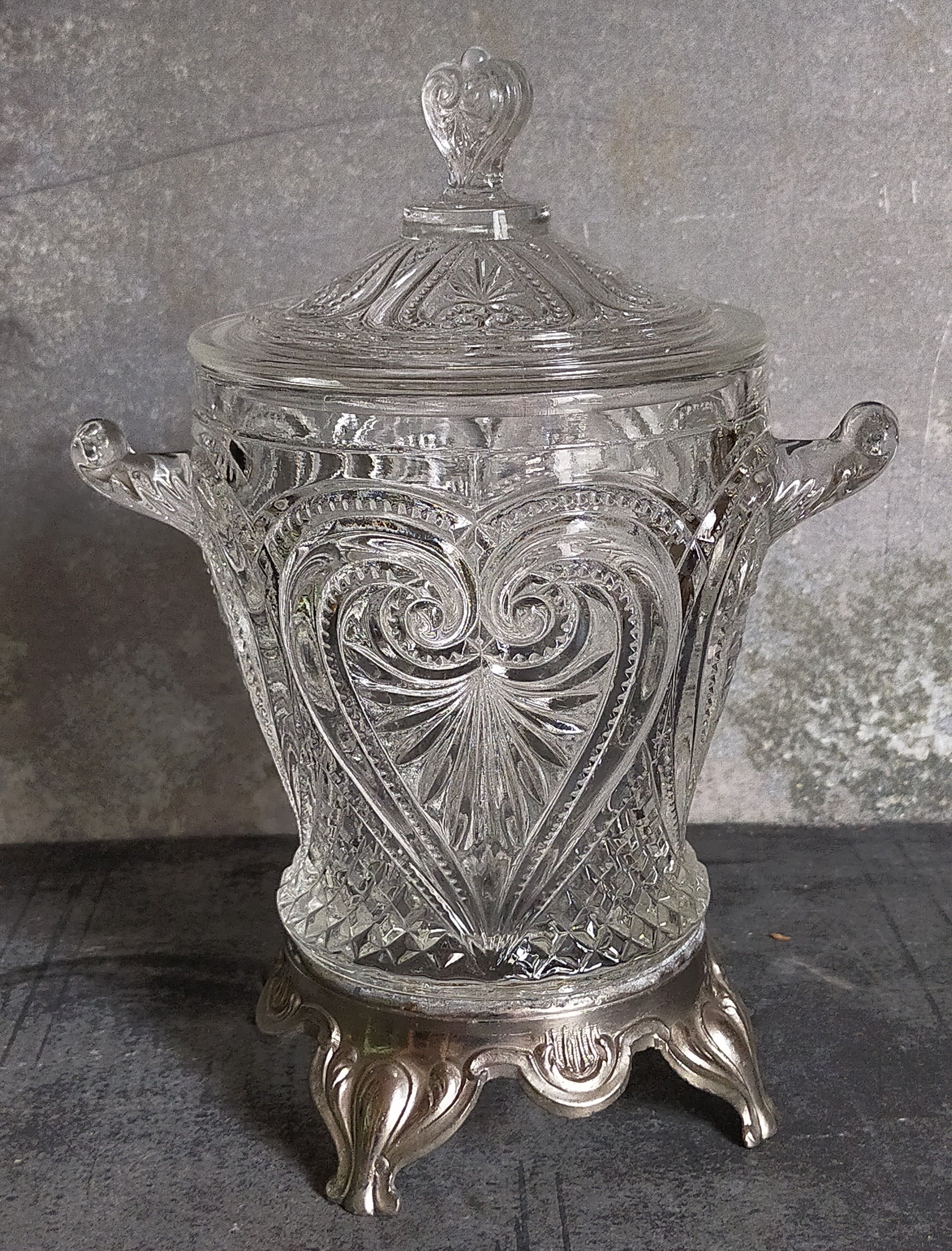 Antique glass compotier on metal stand