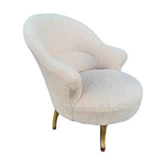 Fauteuil crapaud tissu bouclettes effet mouton
