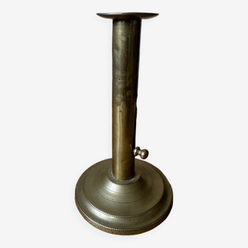 Old brass pull candle holder