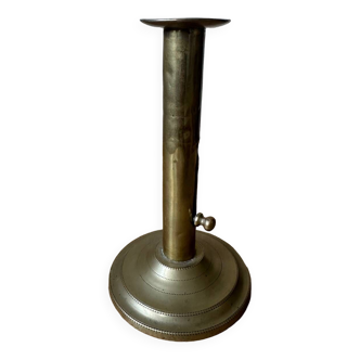 Old brass pull candle holder