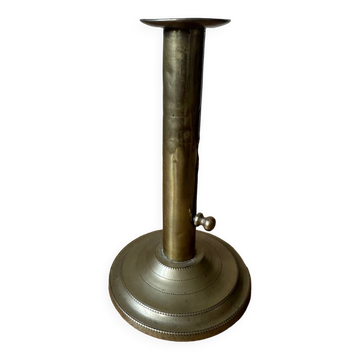 Old brass pull candle holder