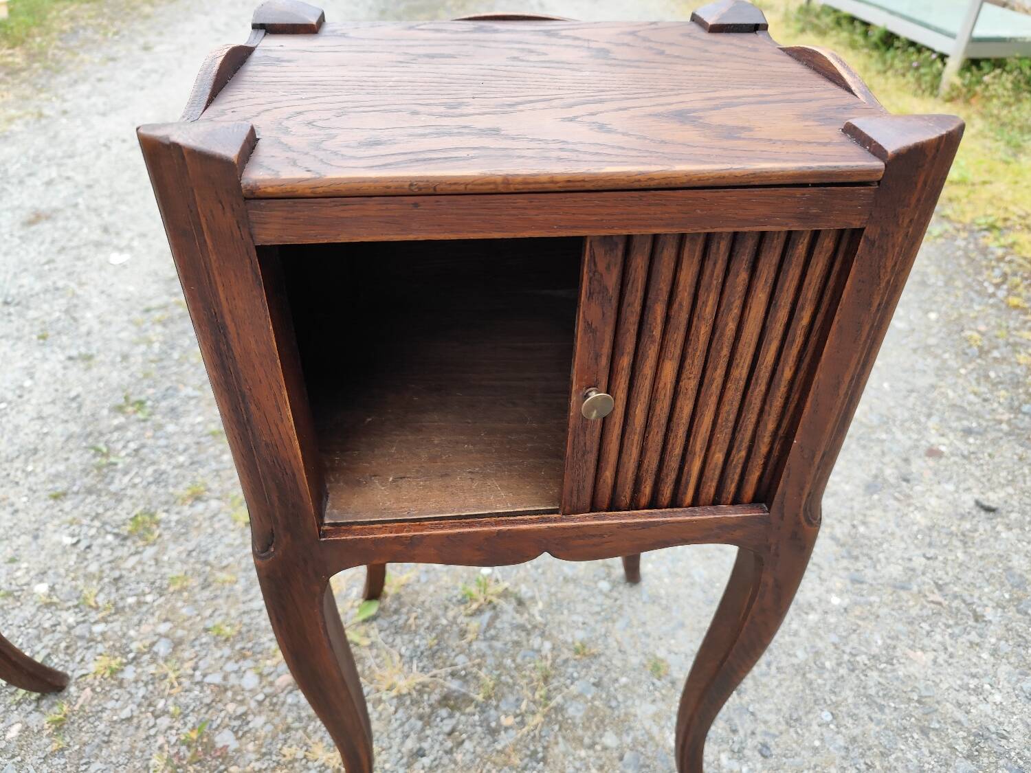 Pair of oak bedside tables with curtained niche doors