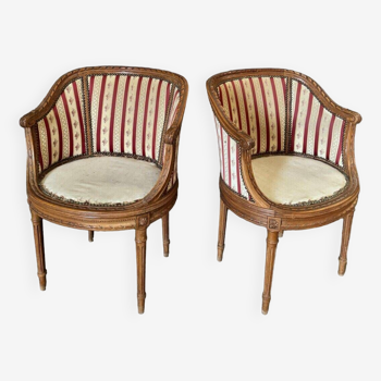 Pair of late 19th century Louis XVI style armchairs in basket-shaped walnut