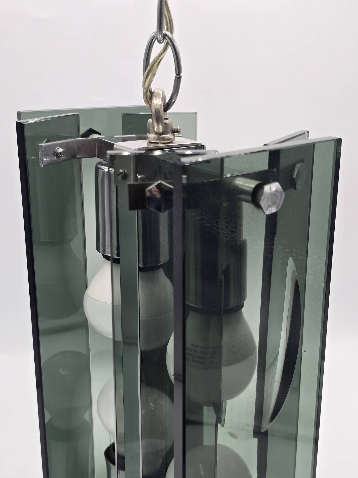 Green-grey glass and chrome metal suspension, in the style of Fontana Arte.