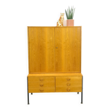 Armoire en placage Hellerau avec pieds et tiroirs en acier