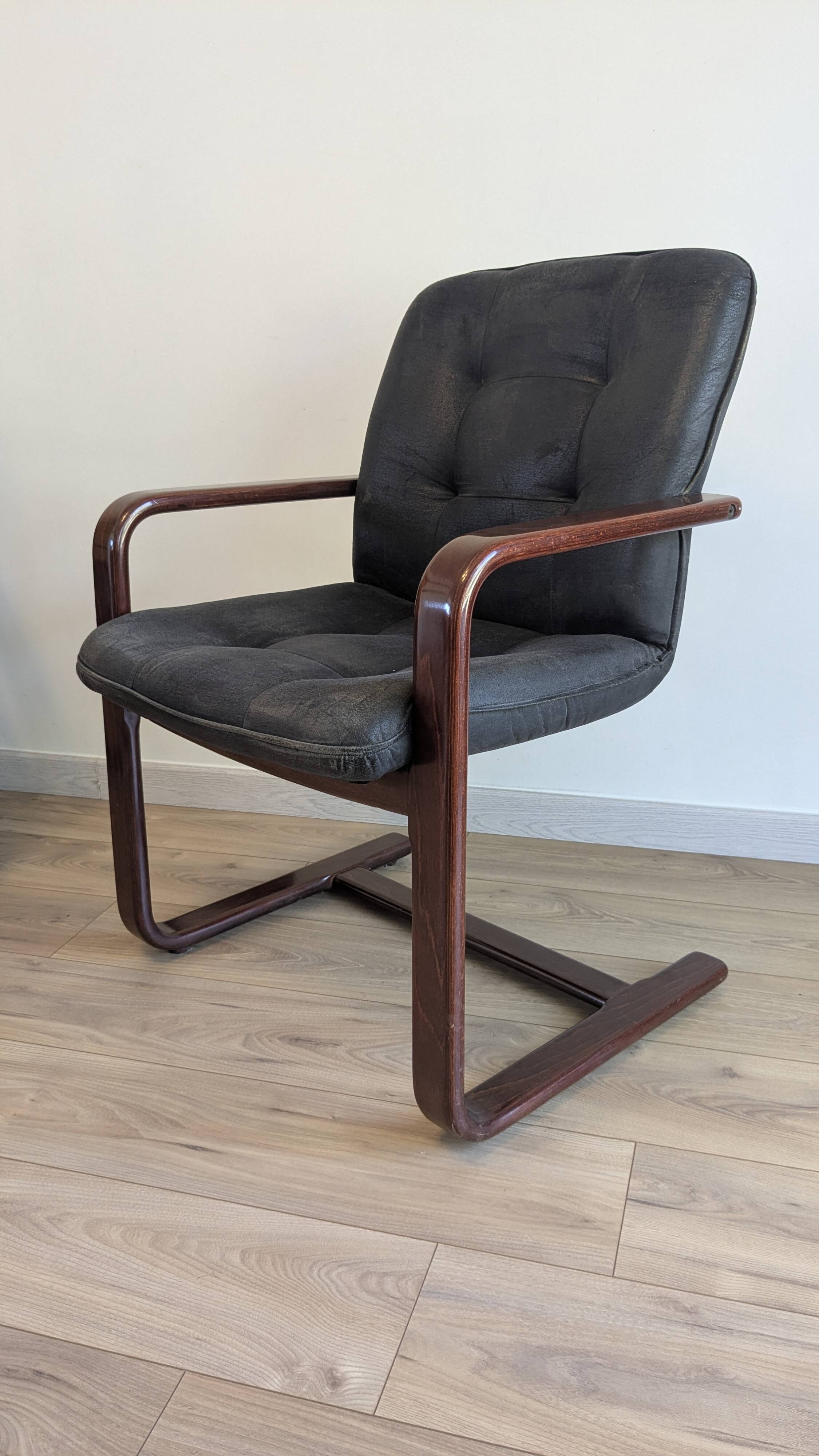 Pair of vintage cantilever armchairs in rosewood veneer.