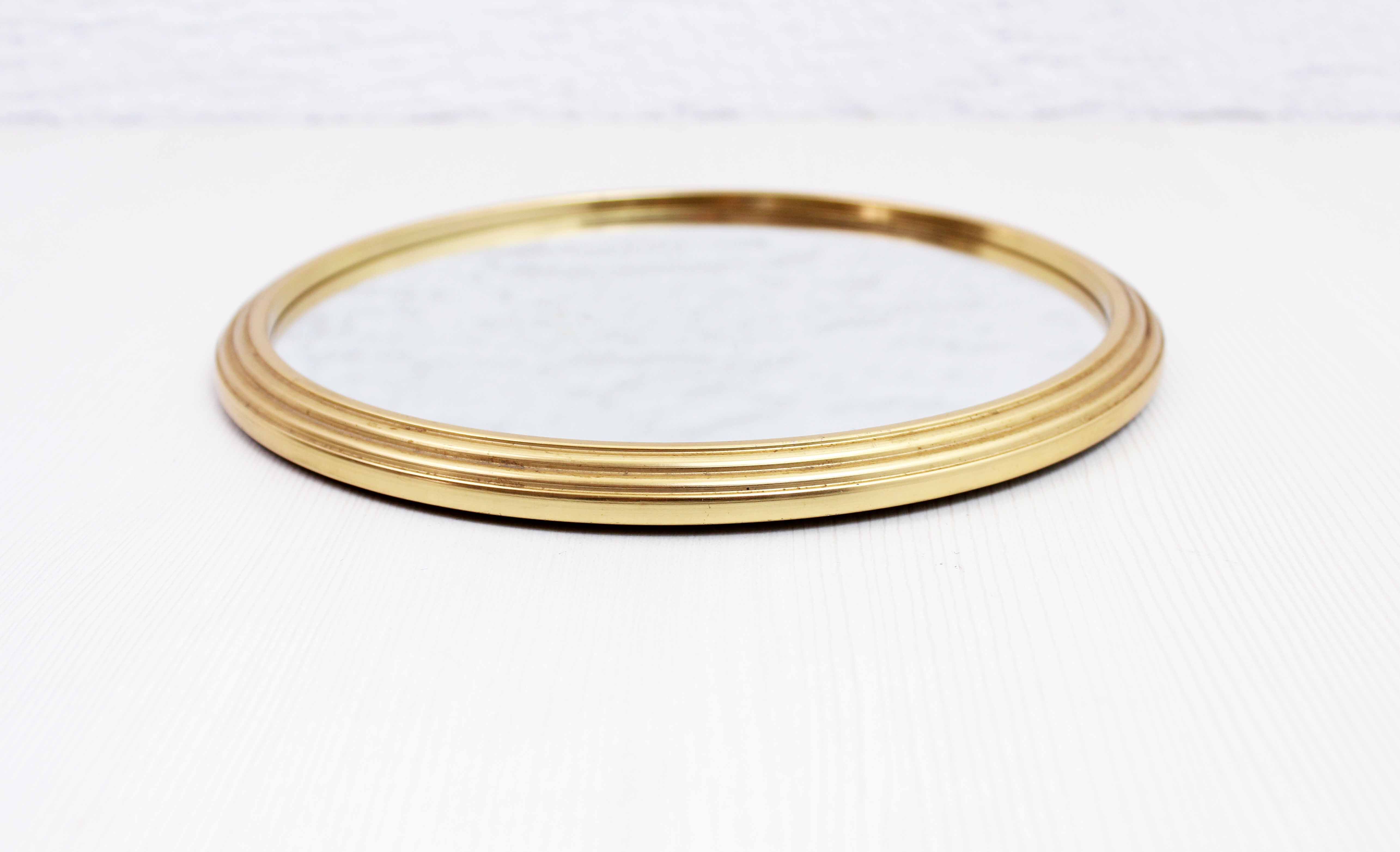 Round brass mirror top