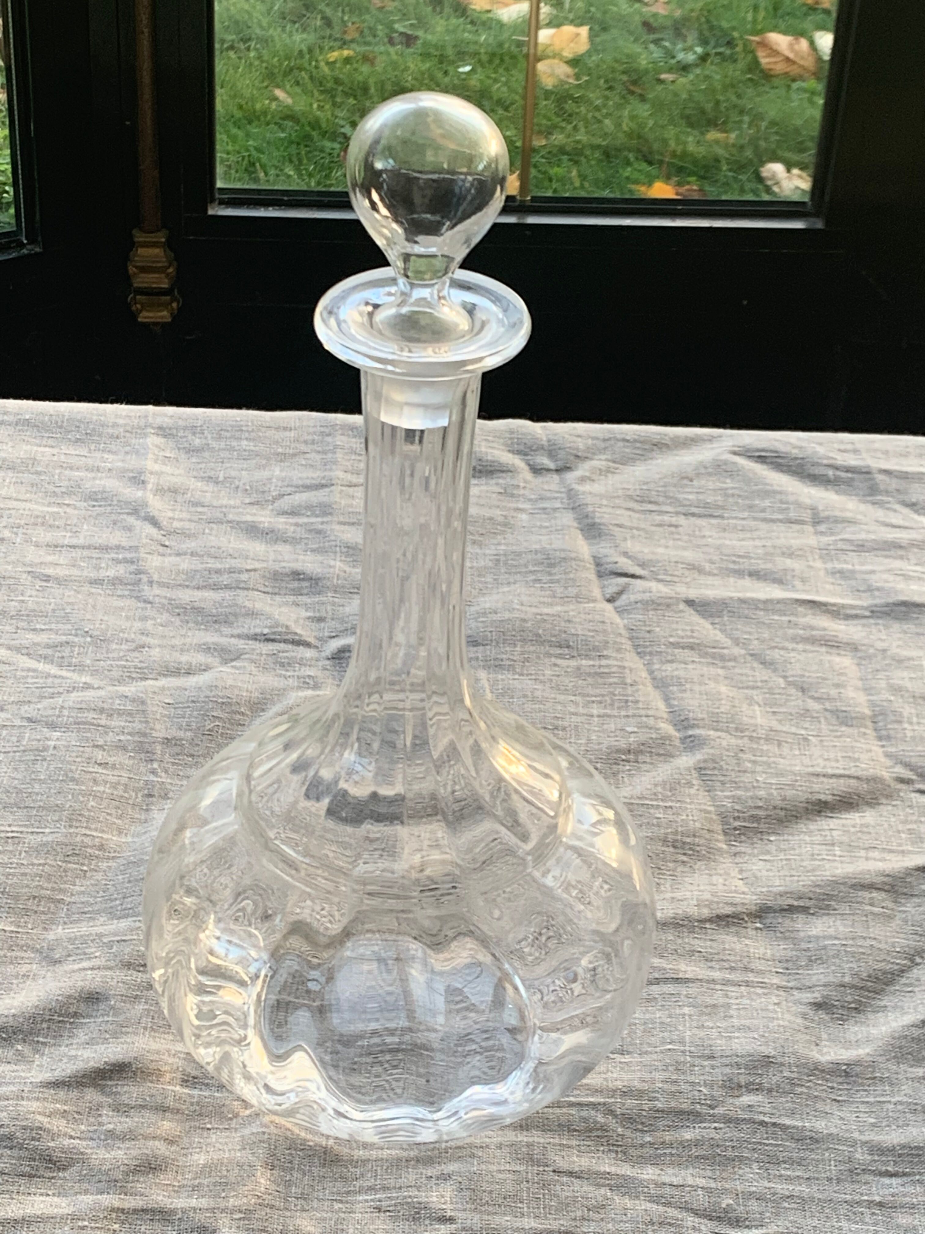 Elegant and vintage transparent glass wine decanter