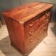 Small Louis Philippe chest of drawers with cut corners.