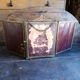 Antique French gilt metal triptych vanity mirror with floral crest