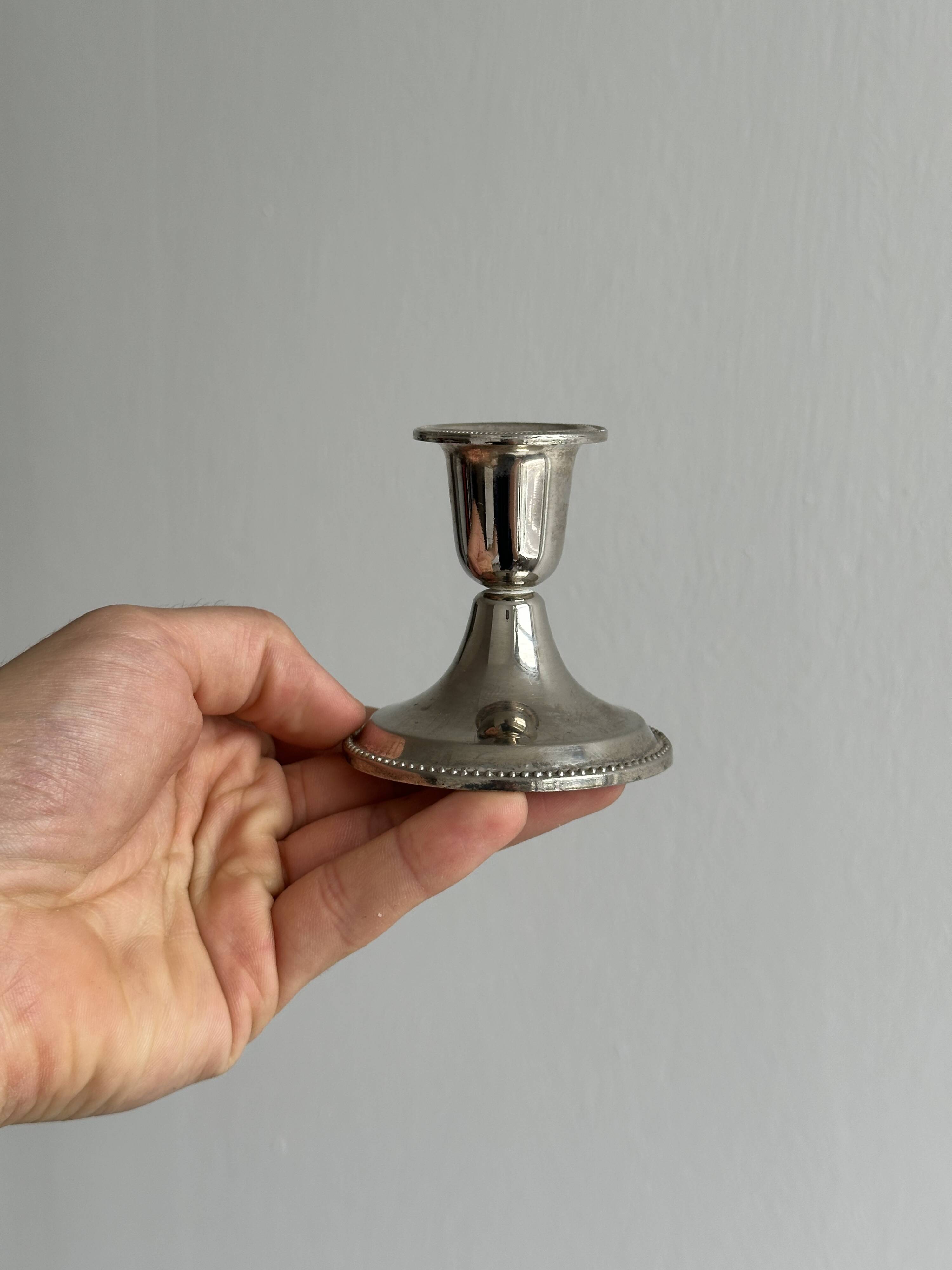 4 vintage metal candle holders