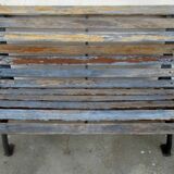 Small garden bench, with cast iron legs.