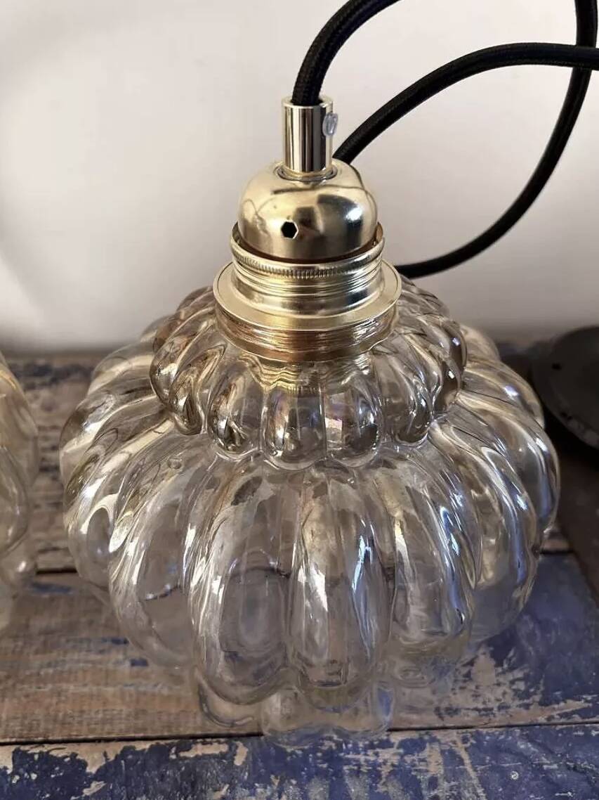 Pair of vintage amber glass pendant lights