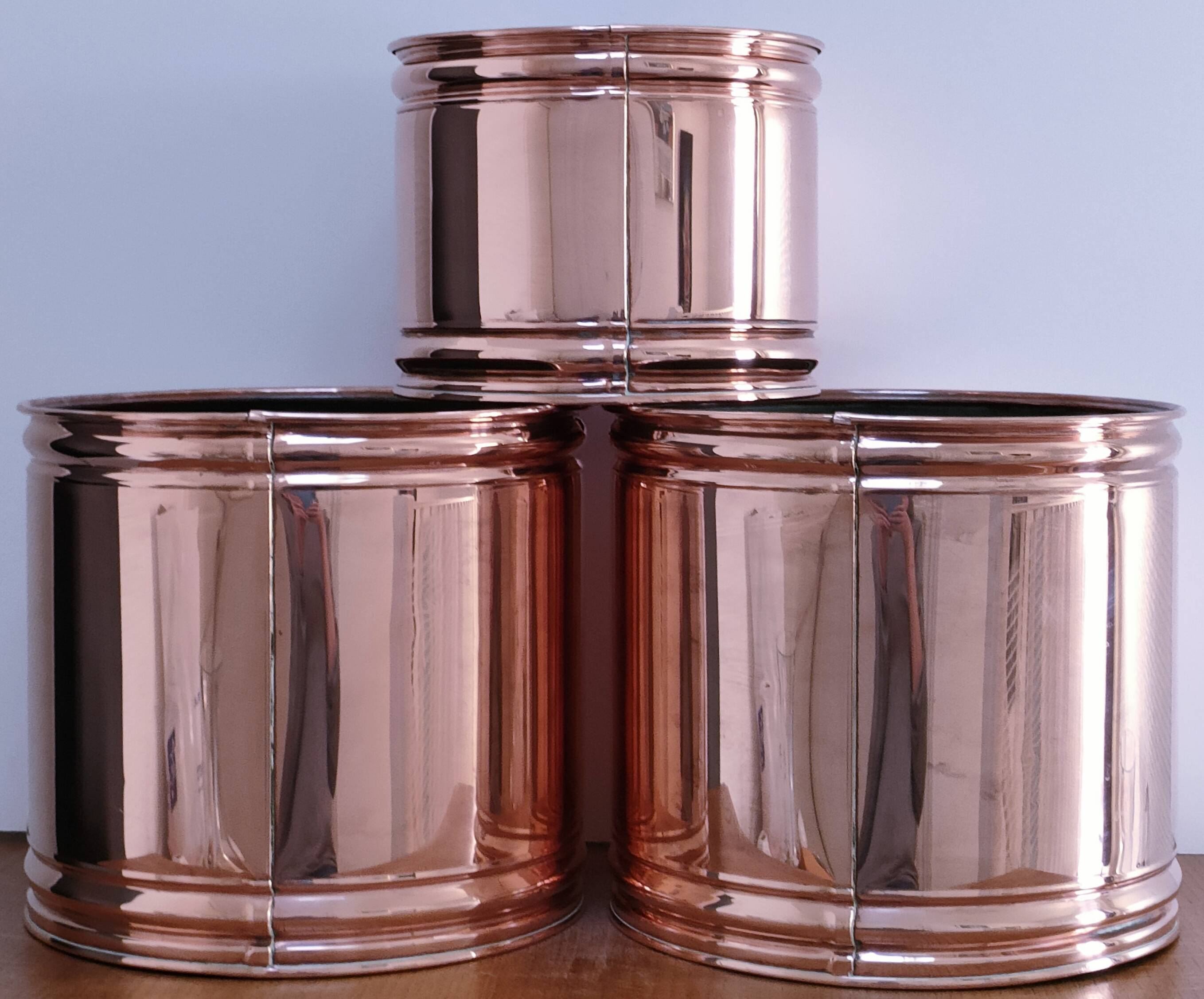 three cylindrical plant pots in a Scandinavian design from the 80s