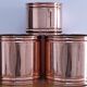 three cylindrical plant pots in a Scandinavian design from the 80s