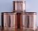 three cylindrical plant pots in a Scandinavian design from the 80s