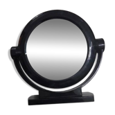 Vintage round pivoting mirror in black, retro style from the 70s/80s.