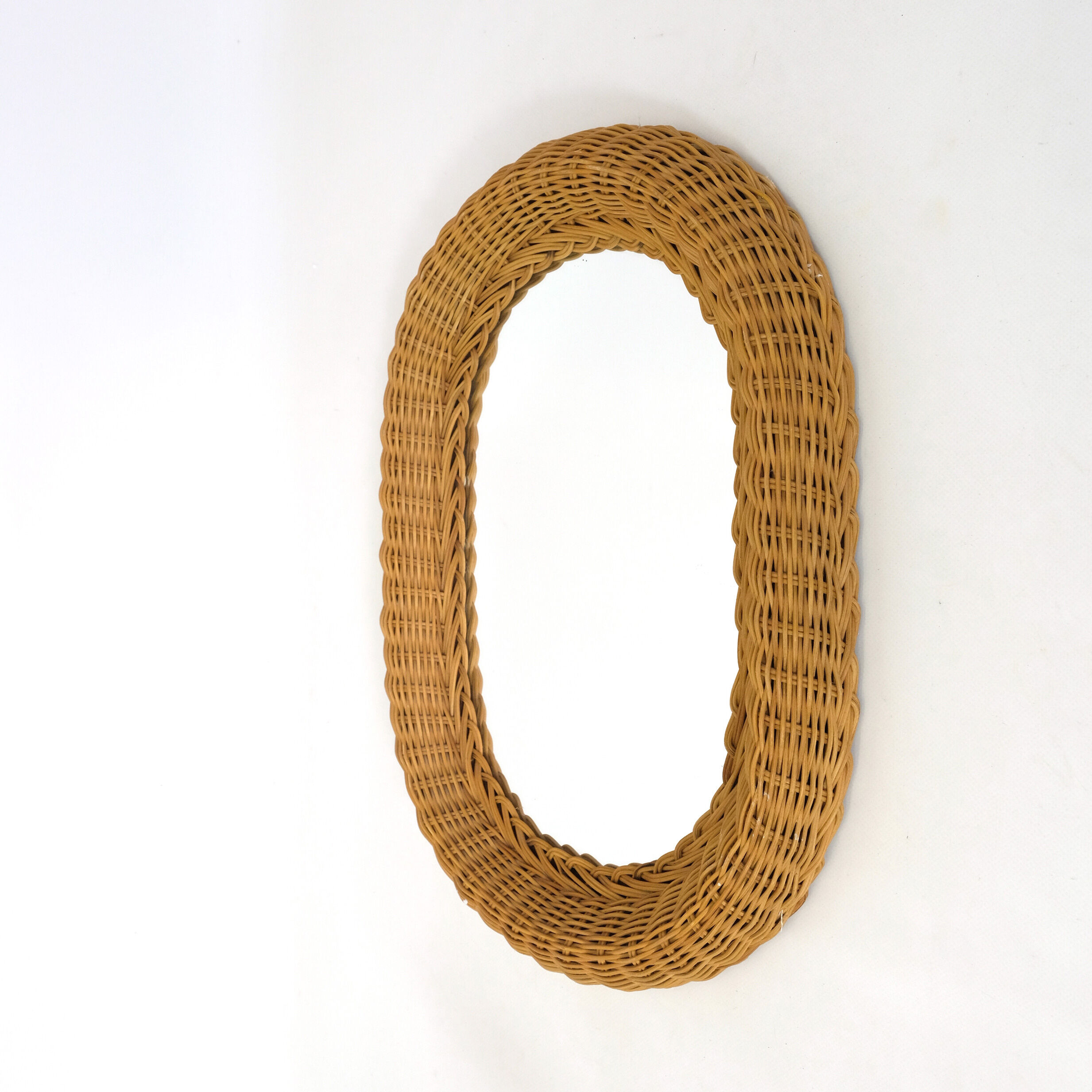 Mirror with thick wicker frame, 54x38 cm.
