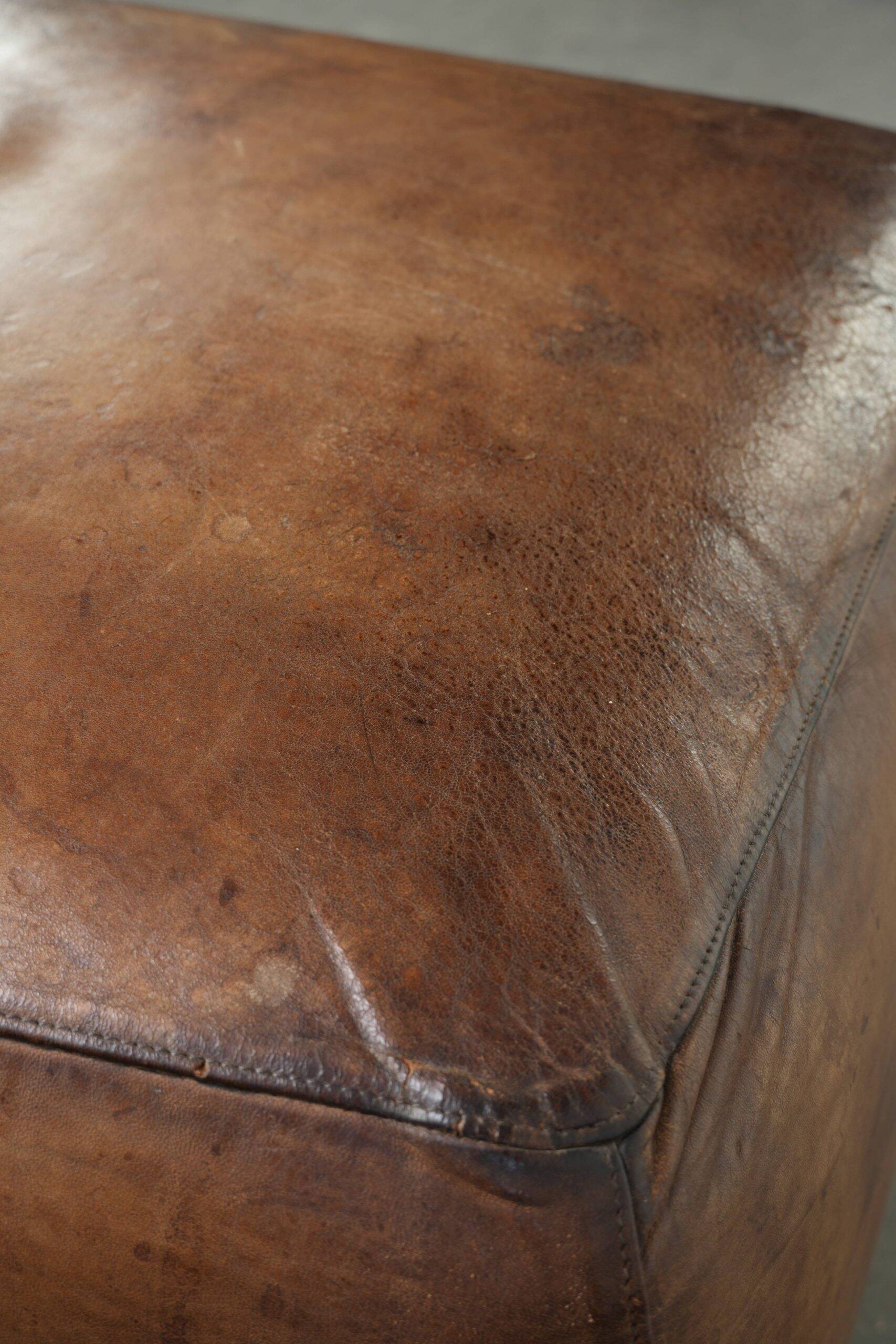 Sheepskin design ottoman with a very beautiful patina and stunning colours