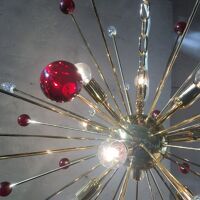 Transparent and red “star” chandelier in sputnik murano glass