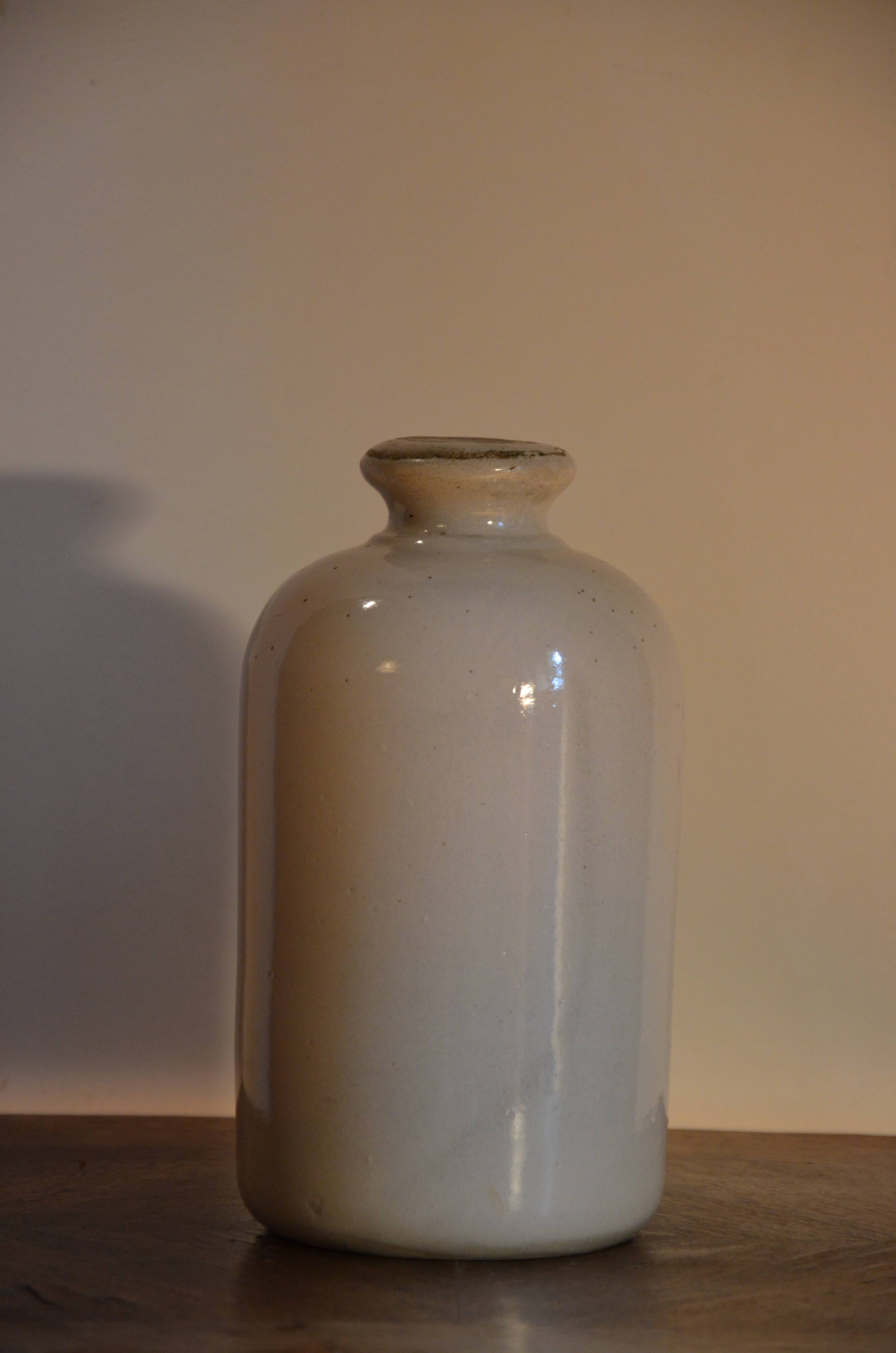 Off-white ceramic soliflore bottle