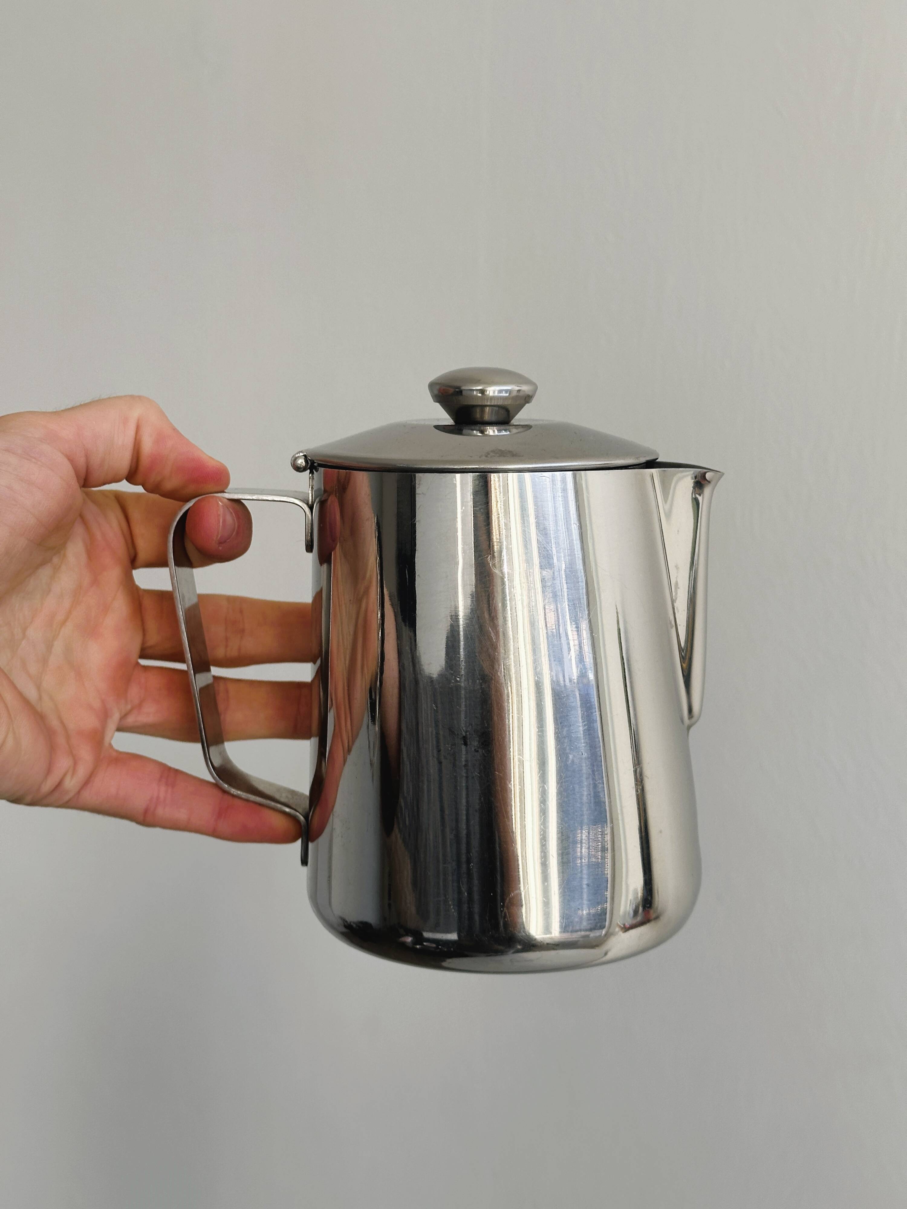 Milk jug, carafe in shiny stainless steel
