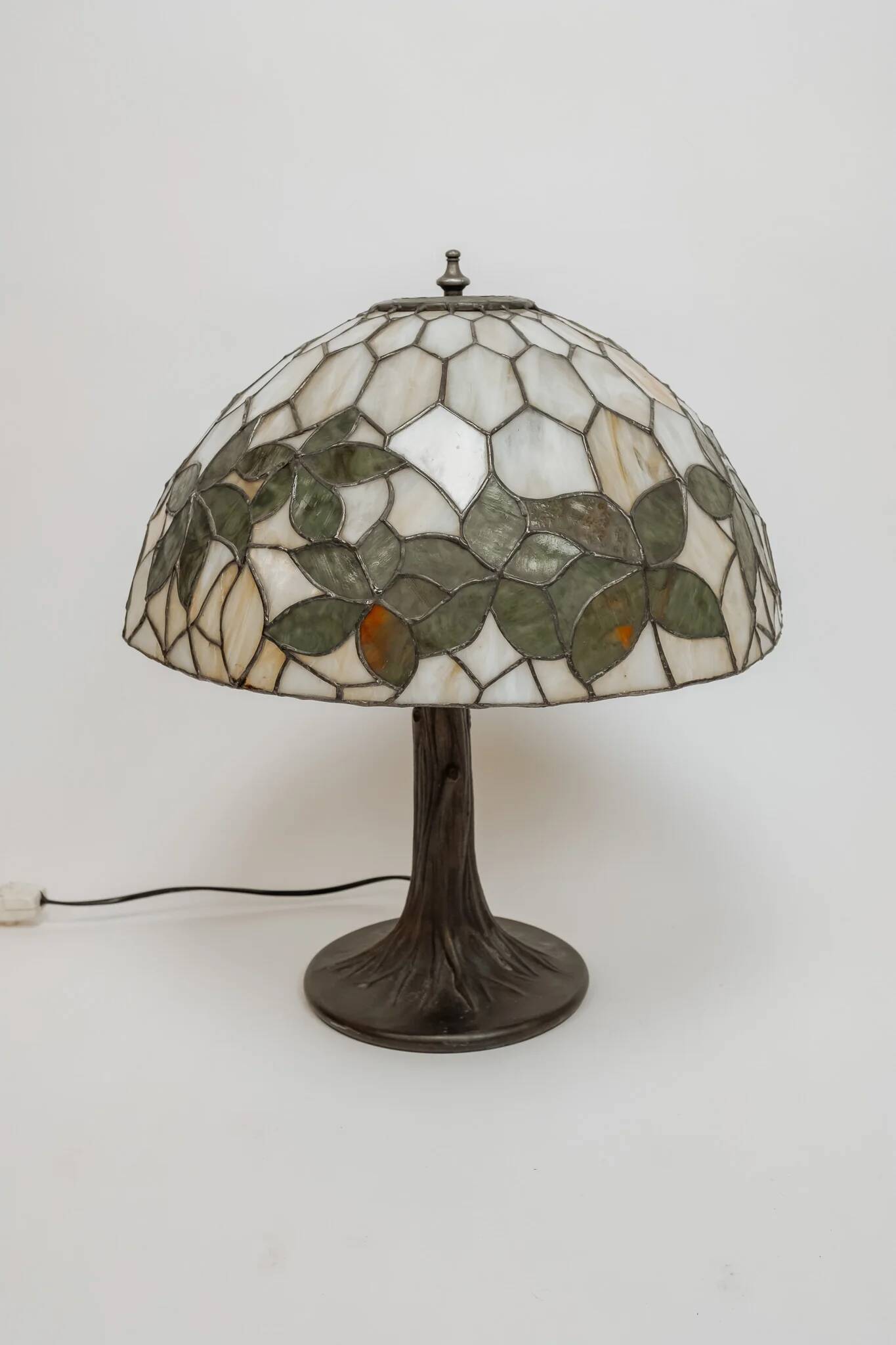 Tiffany-style table lamp with stained glass shade