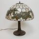 Tiffany-style table lamp with stained glass shade