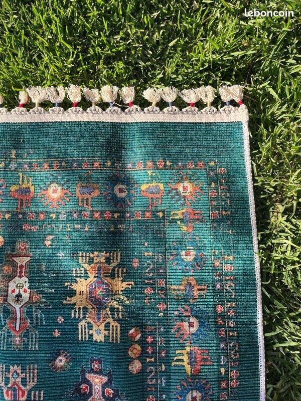 Modern rug with traditional Eastern patterns available for delivery only.
