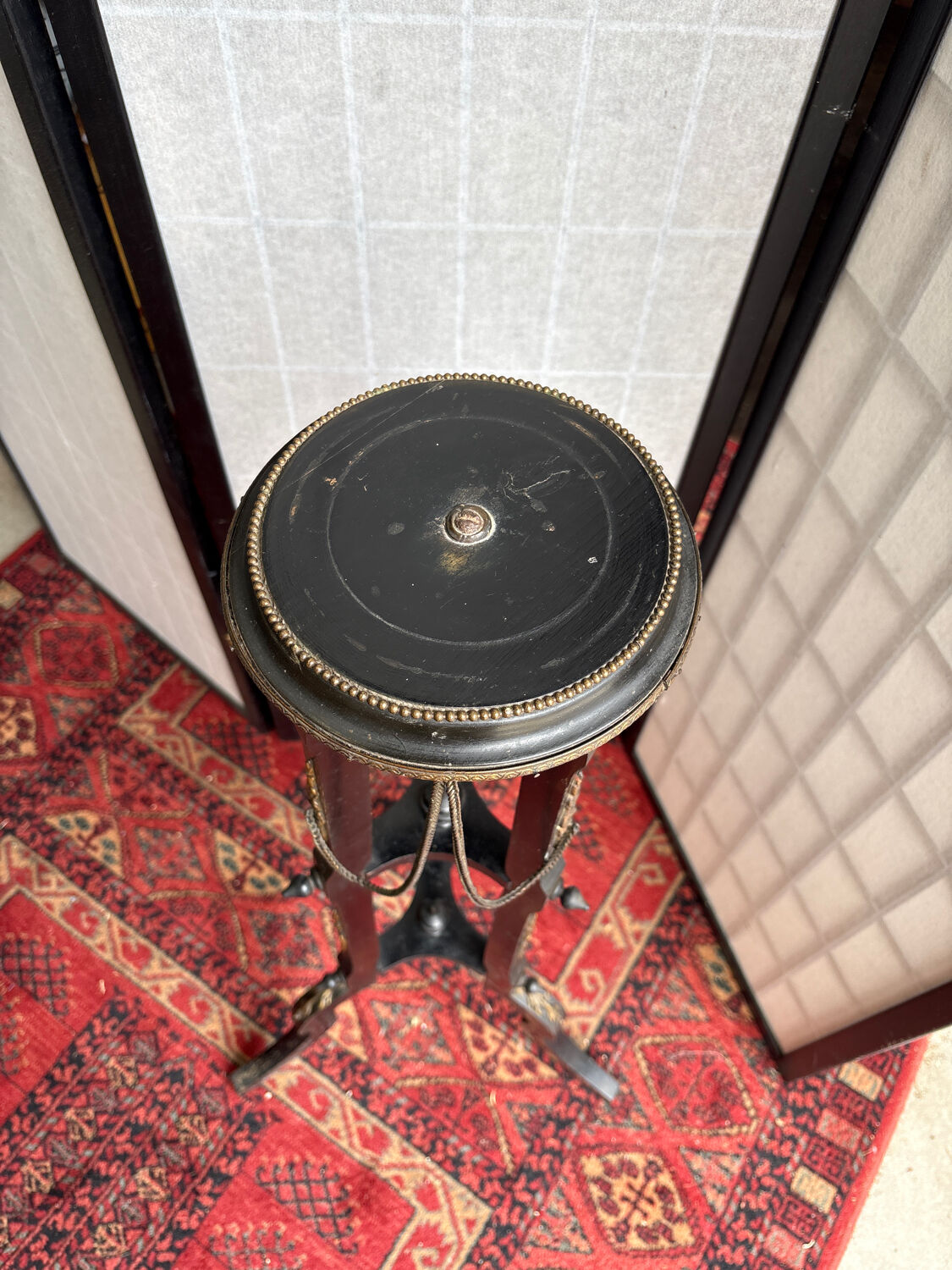 Napoleon III side table in blackened wood and bronze, decorated with chains, 19th century.