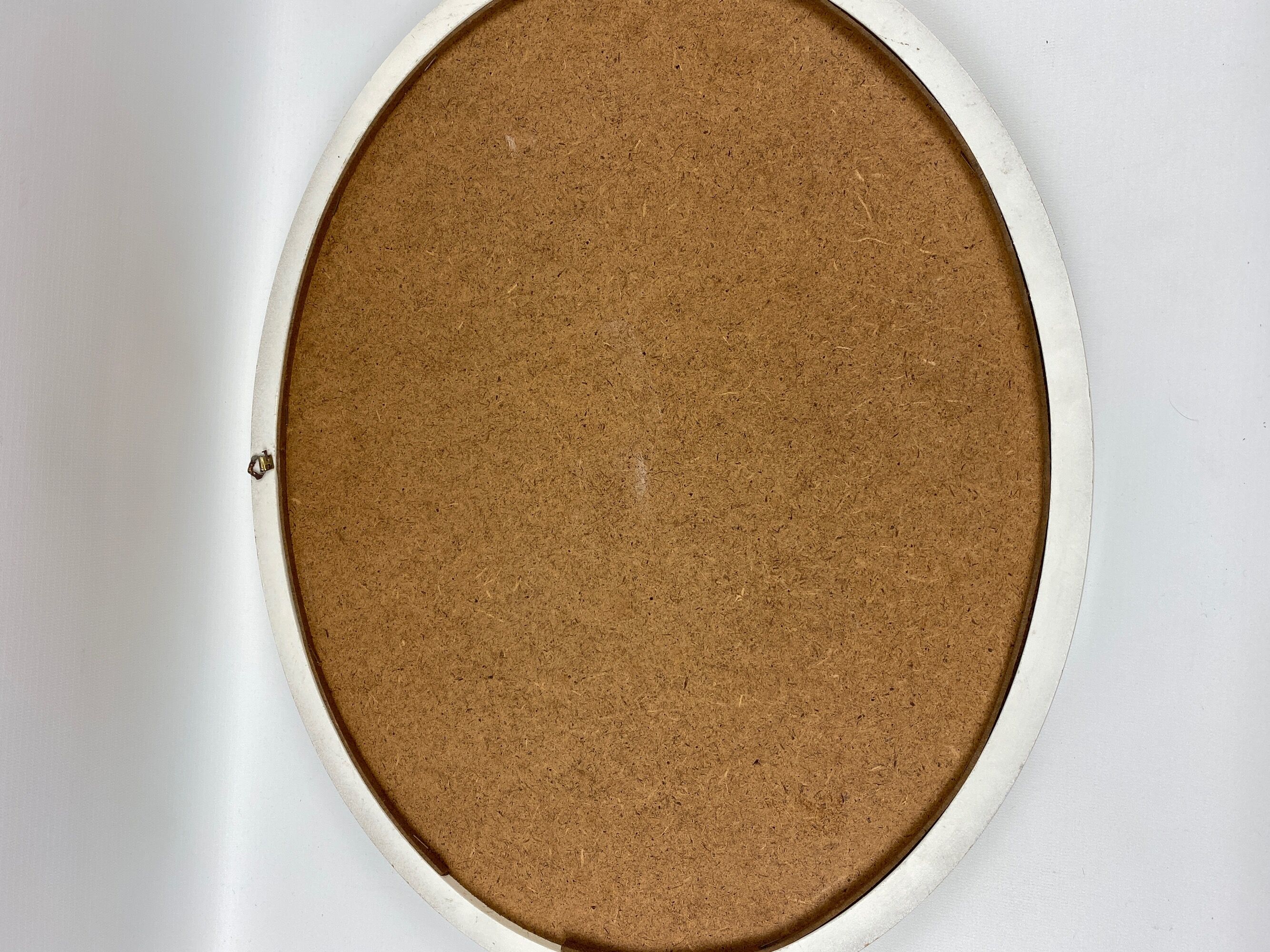 Oval mirror in white melaminate wood